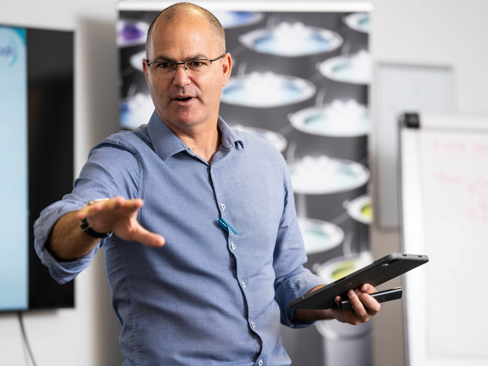 man delivering presentation