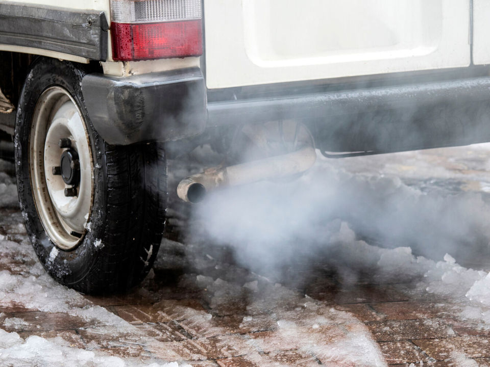 Exhaust of lorry emitting diesel fumes