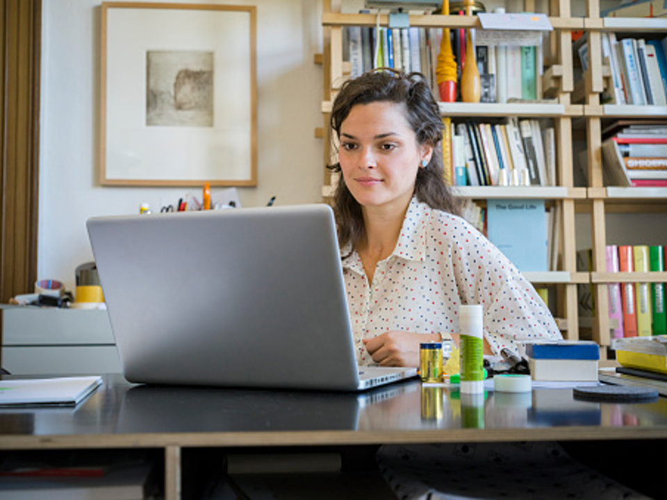 Woman working at laptop