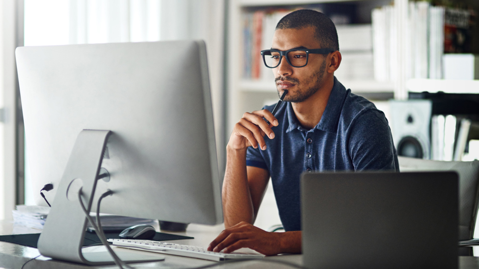 Man sitting at a computer