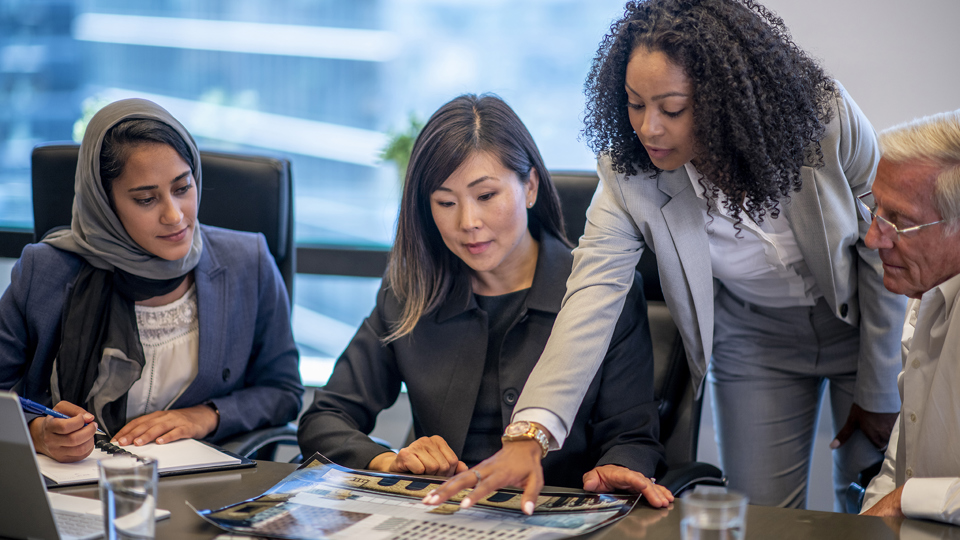 People together around a desk